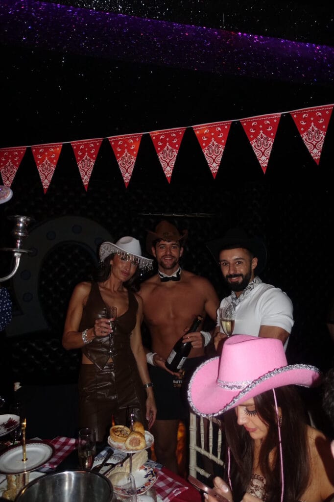 A butler in the buff serving drinks at a hen party in Bristol