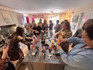 A hen party group making cocktails together at a Butler Direct party