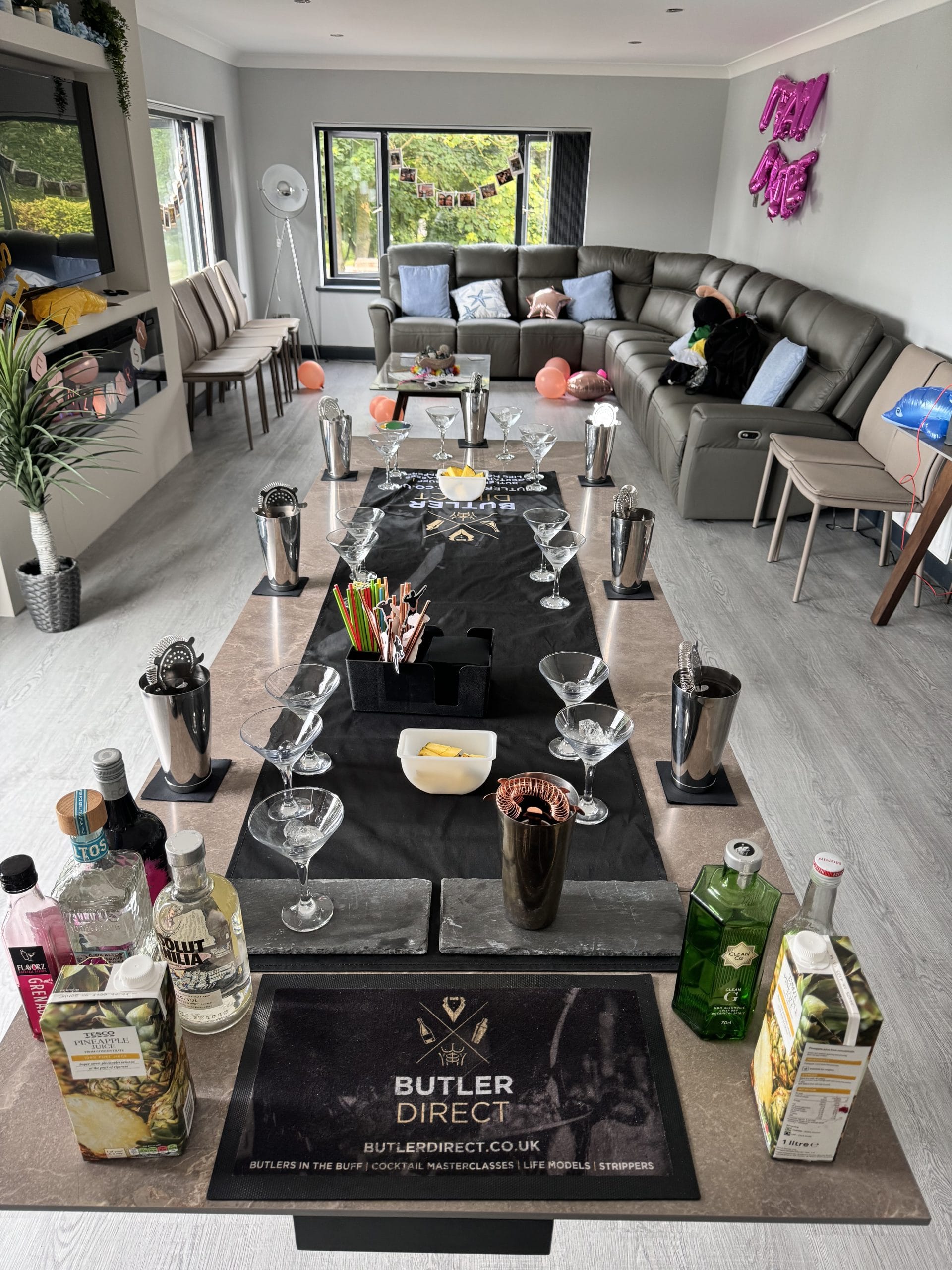 Cocktail masterclass kit laid out by Butler Direct before a hen party