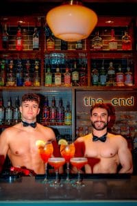 Two buff butlers serving cocktails at the buff butler bottomless brunch at The End, Leeds